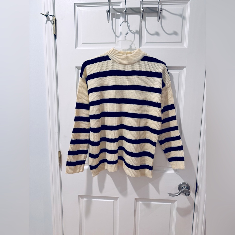 CREAM WITH BLACK STRIPE MOCK NECK SWEATER. DROP SHOULDERS SLIGHTLY OVERSIZED FIT